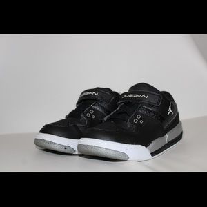 Black and gray toddle Jordans